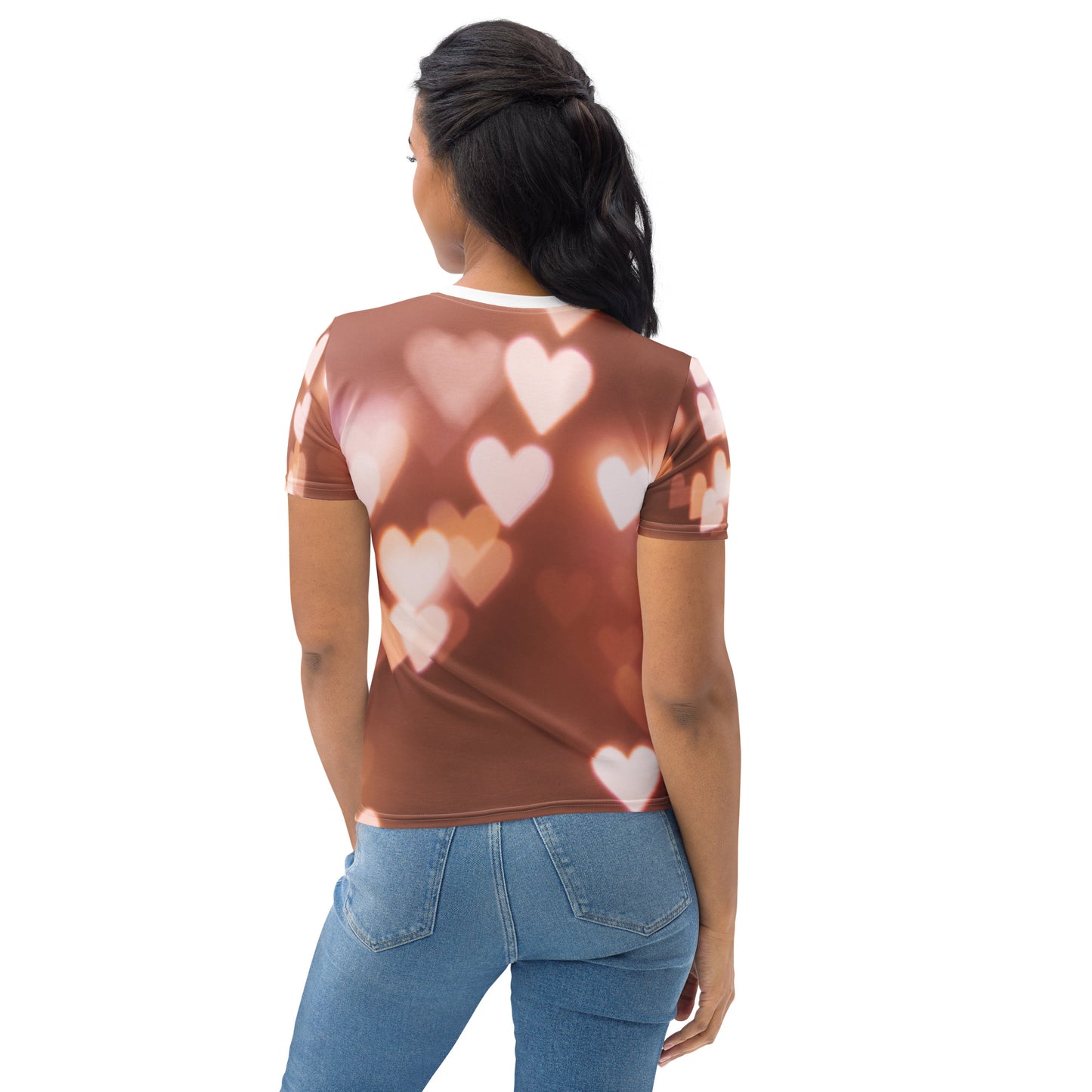 Back view of woman wearing PJ Designs cute pink fitted tee with heart pattern and blue jeans