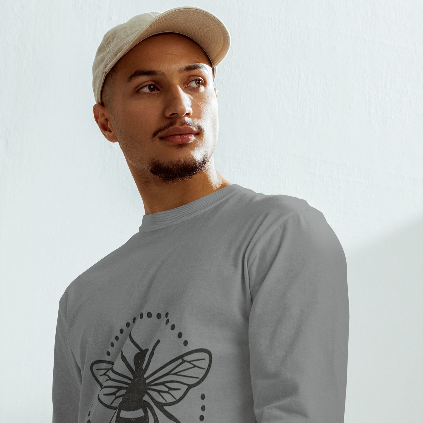 PJ Designs garment-dyed heavyweight long sleeve shirt in gray with bee graphic worn by male model