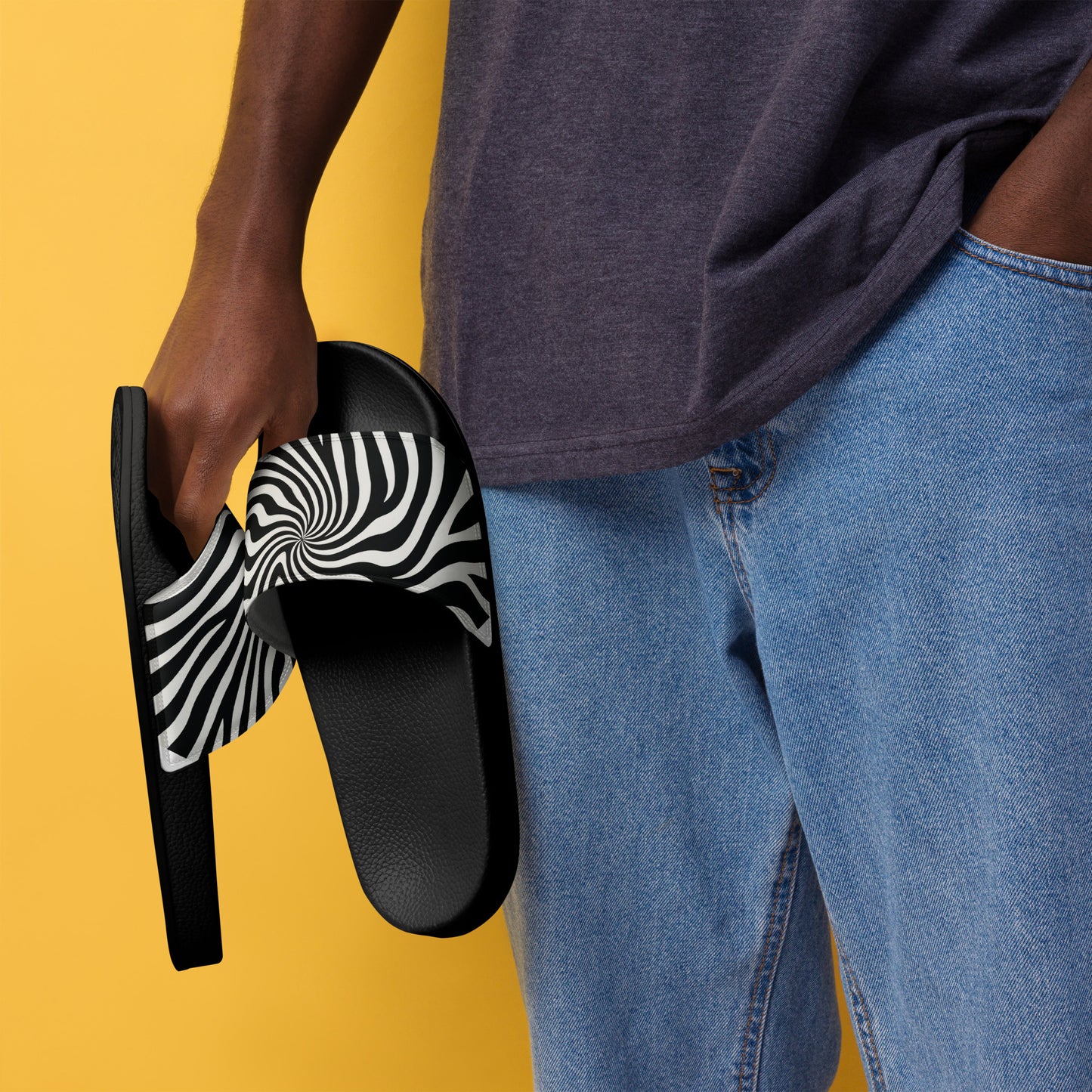 PJ Designs streetwear slides for men with black and white zebra pattern strap held by person in casual outfit