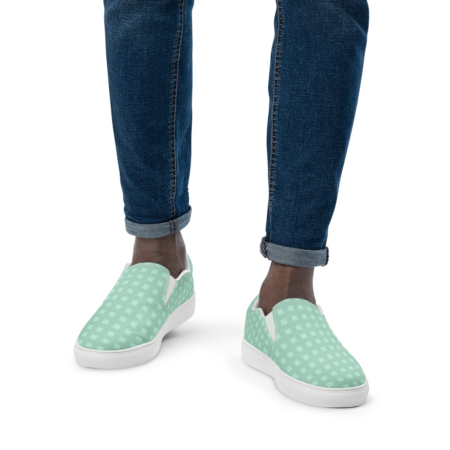 PJ Designs stylish canvas sneakers for men in light green with white sole worn with rolled-up jeans