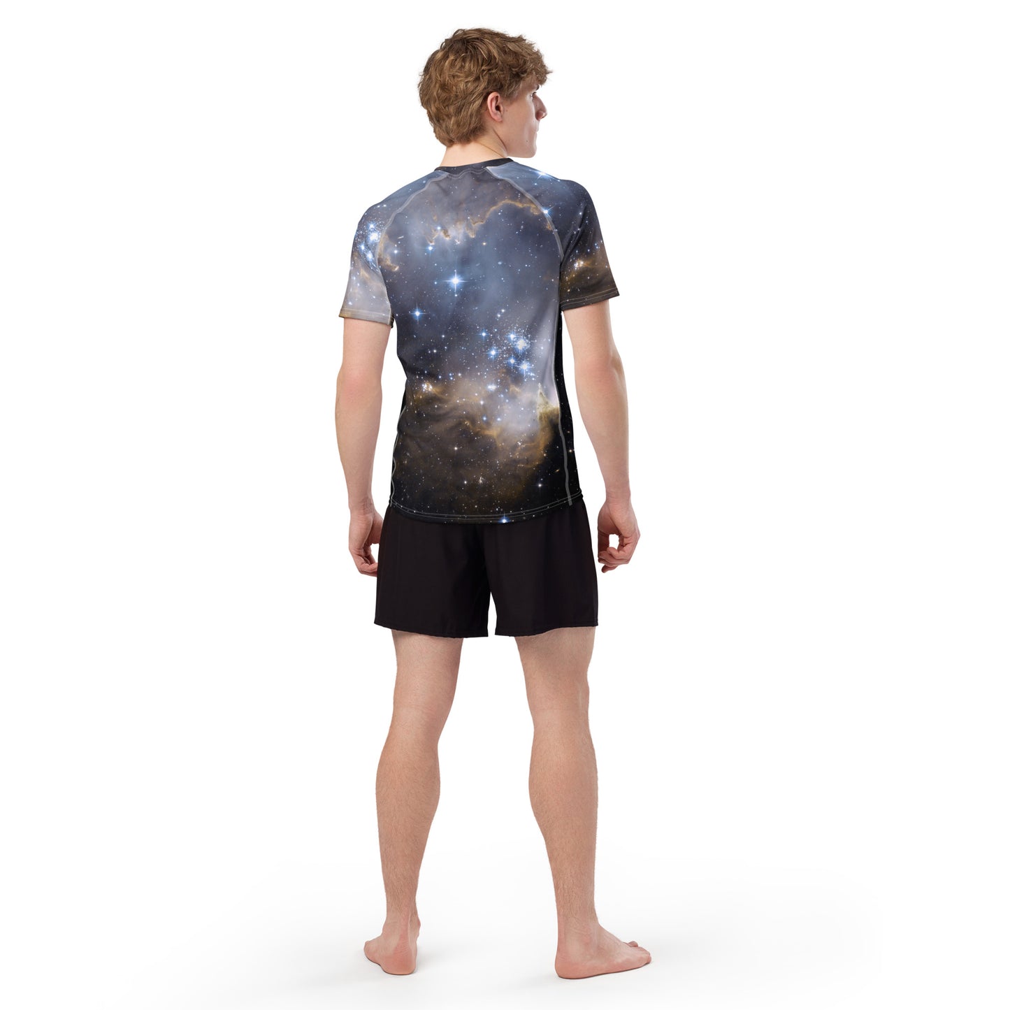 PJ Designs stylish men’s rash guard top with galaxy print worn by a man from back