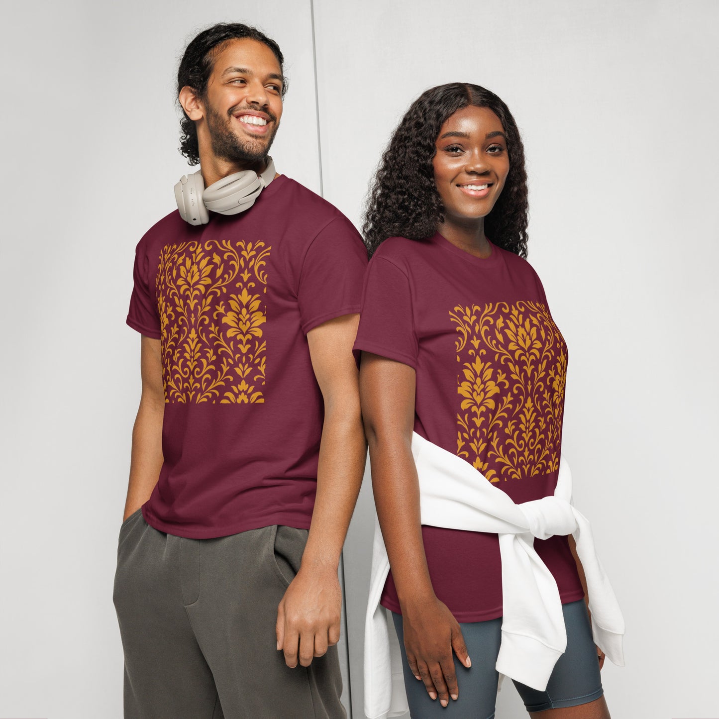 Two PJ Designs models wearing maroon unisex DryBlend t-shirt with gold damask front print