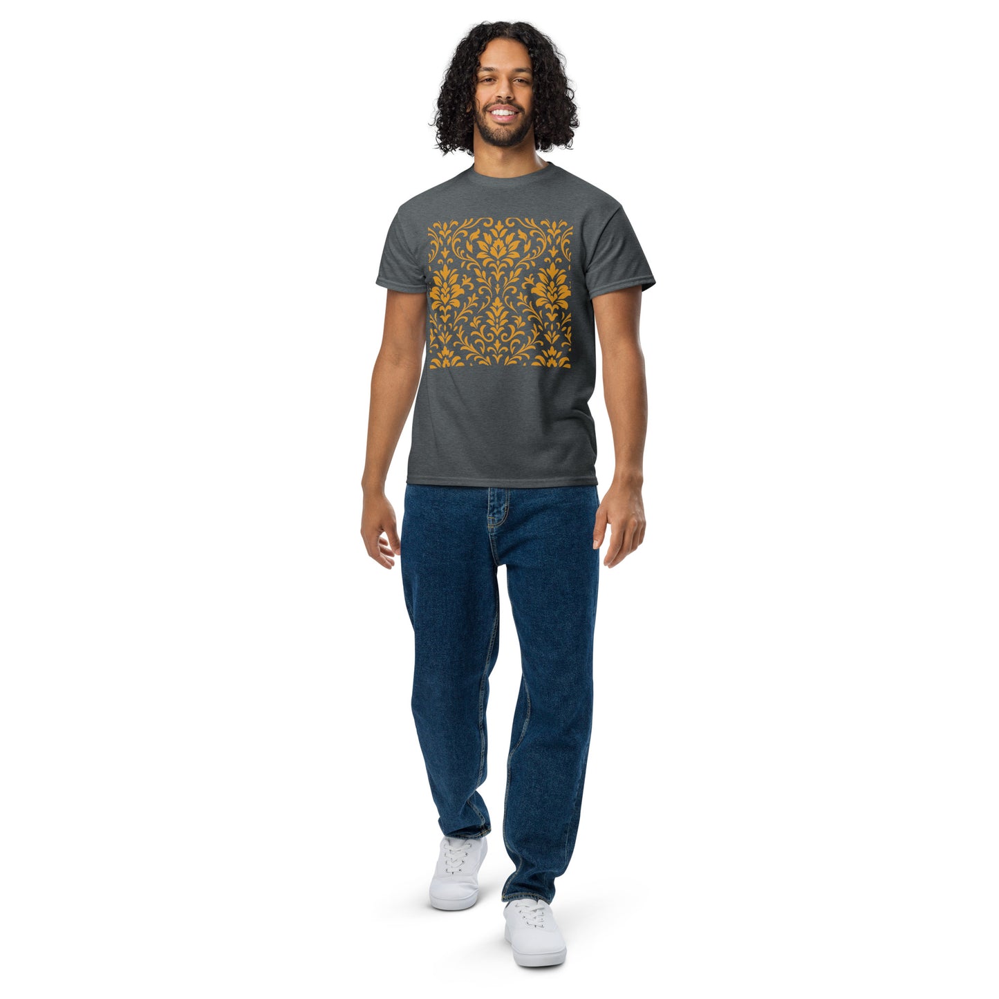 PJ Designs model wearing a charcoal unisex DryBlend t-shirt with gold floral square print paired with jeans and white sneakers