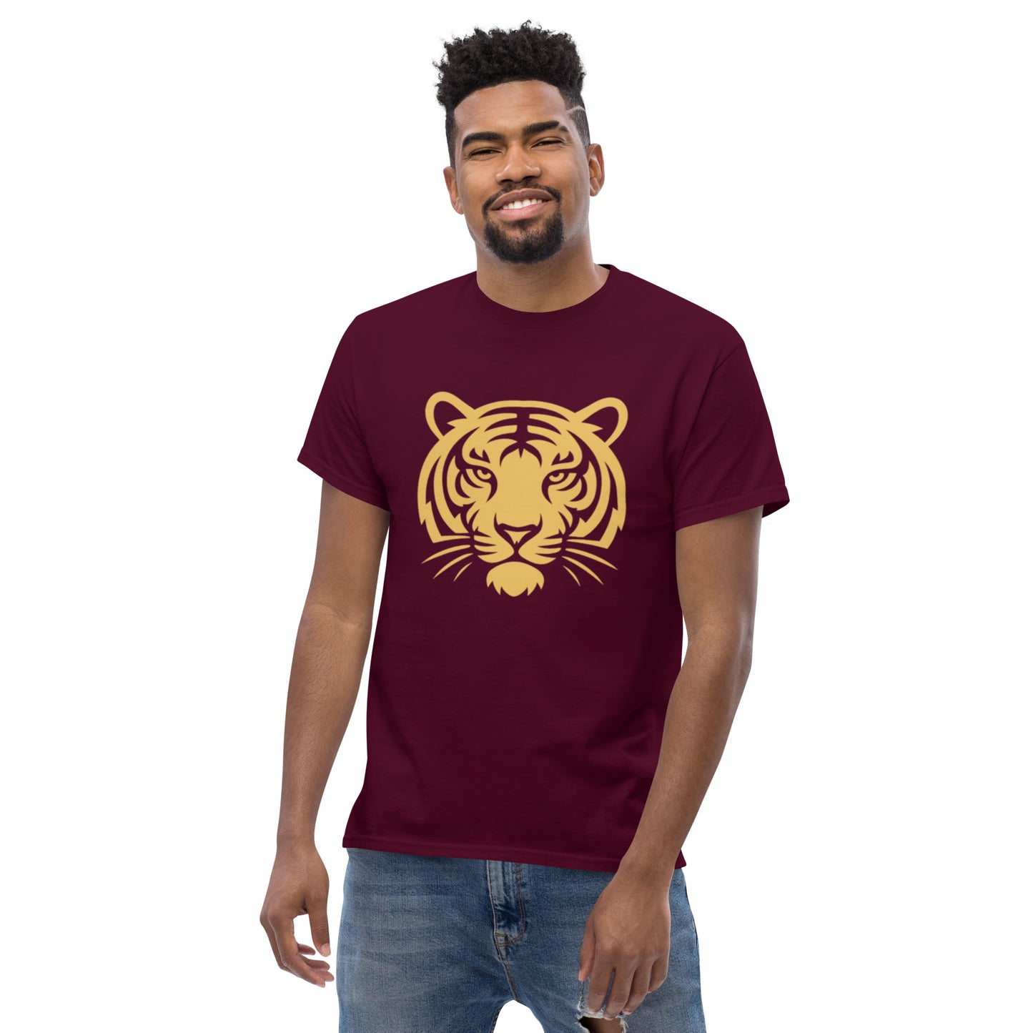 PJ Designs maroon t shirt with gold tiger face worn by smiling model in jeans tiger graphic tee for men and women