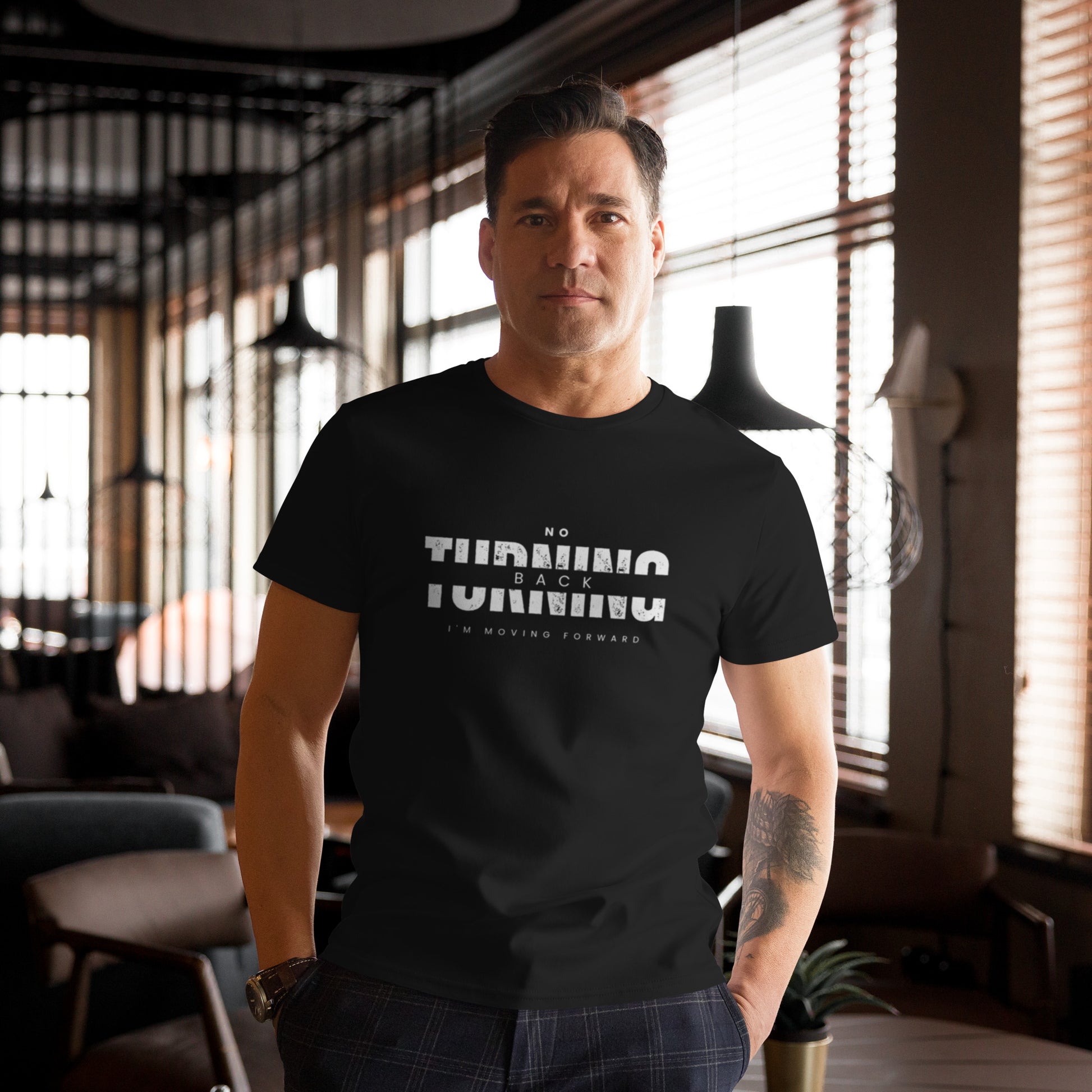 Man wearing a comfortable men's fashion t-shirt by PJ Designs with a no turning back graphic