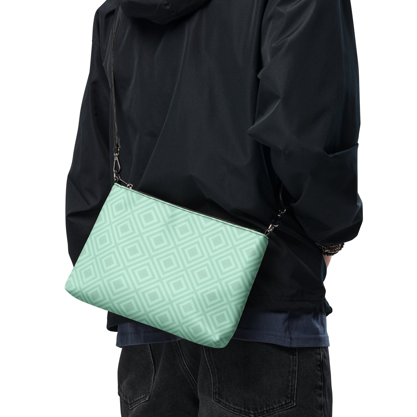 PJ Designs diamond pattern wristlet bag in light green worn crossbody with black strap