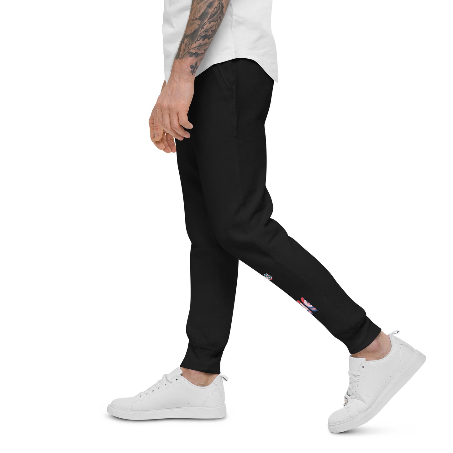 PJ Designs black fleece sweatpants for men and women worn with white sneakers and a white shirt