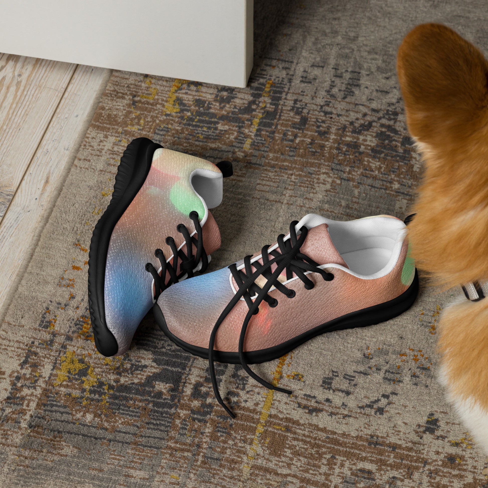 PJ Designs men's colorful running sneakers in pastel tones with black soles and laces on patterned rug