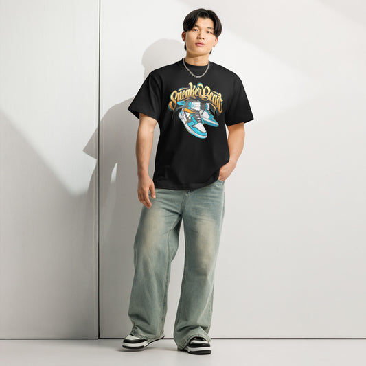 PJ Designs unisex street style box tee black graphic sneaker print worn by male model with baggy jeans