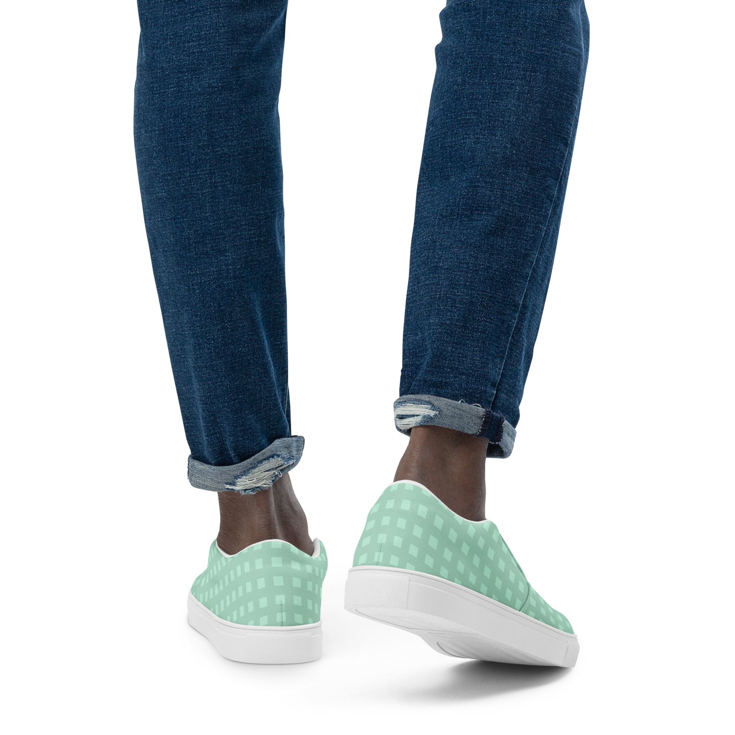 PJ Designs stylish canvas sneakers for men in light green checkered pattern worn with rolled blue jeans
