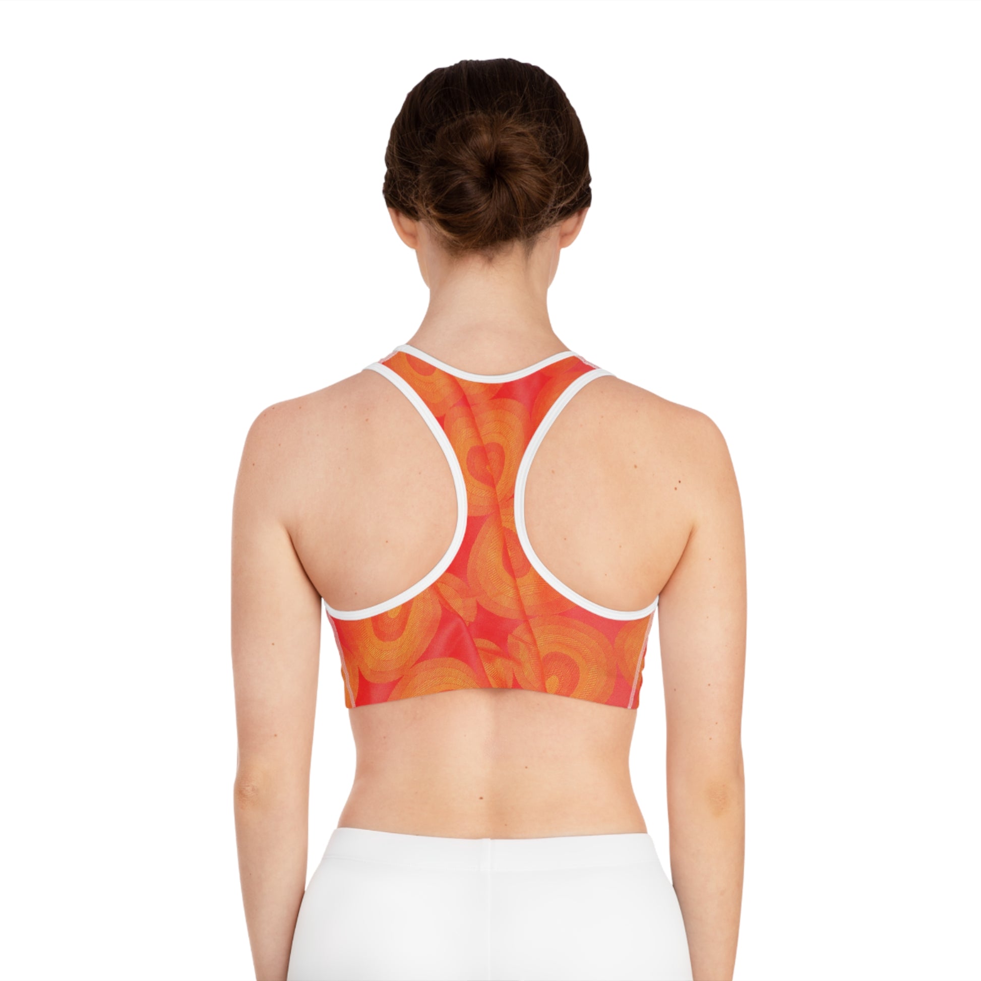 Back view of woman wearing Printify all over prints summer fitness activewear top in orange pattern
