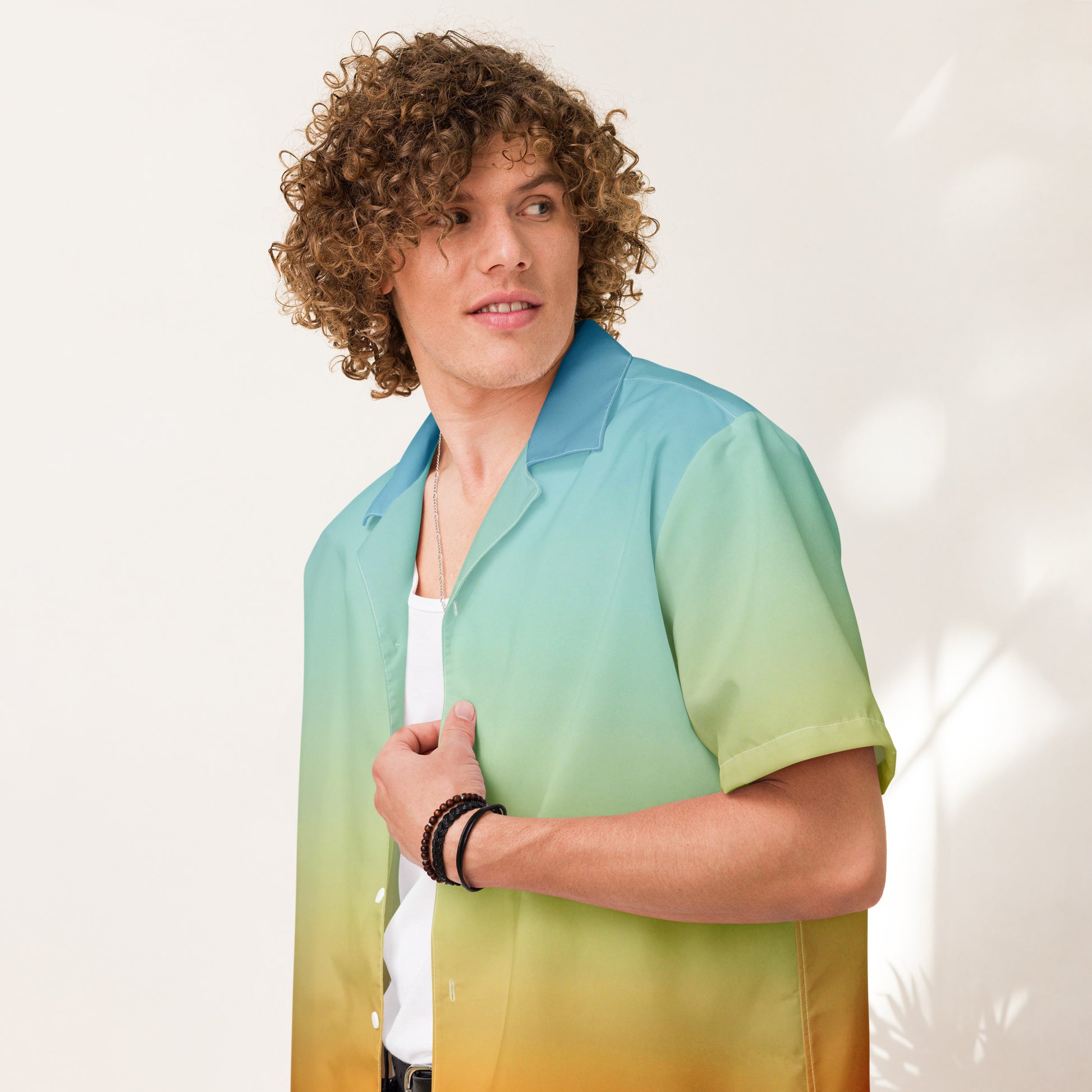 PJ Designs summer short sleeve unisex shirt with gradient blue green and yellow colors on male model