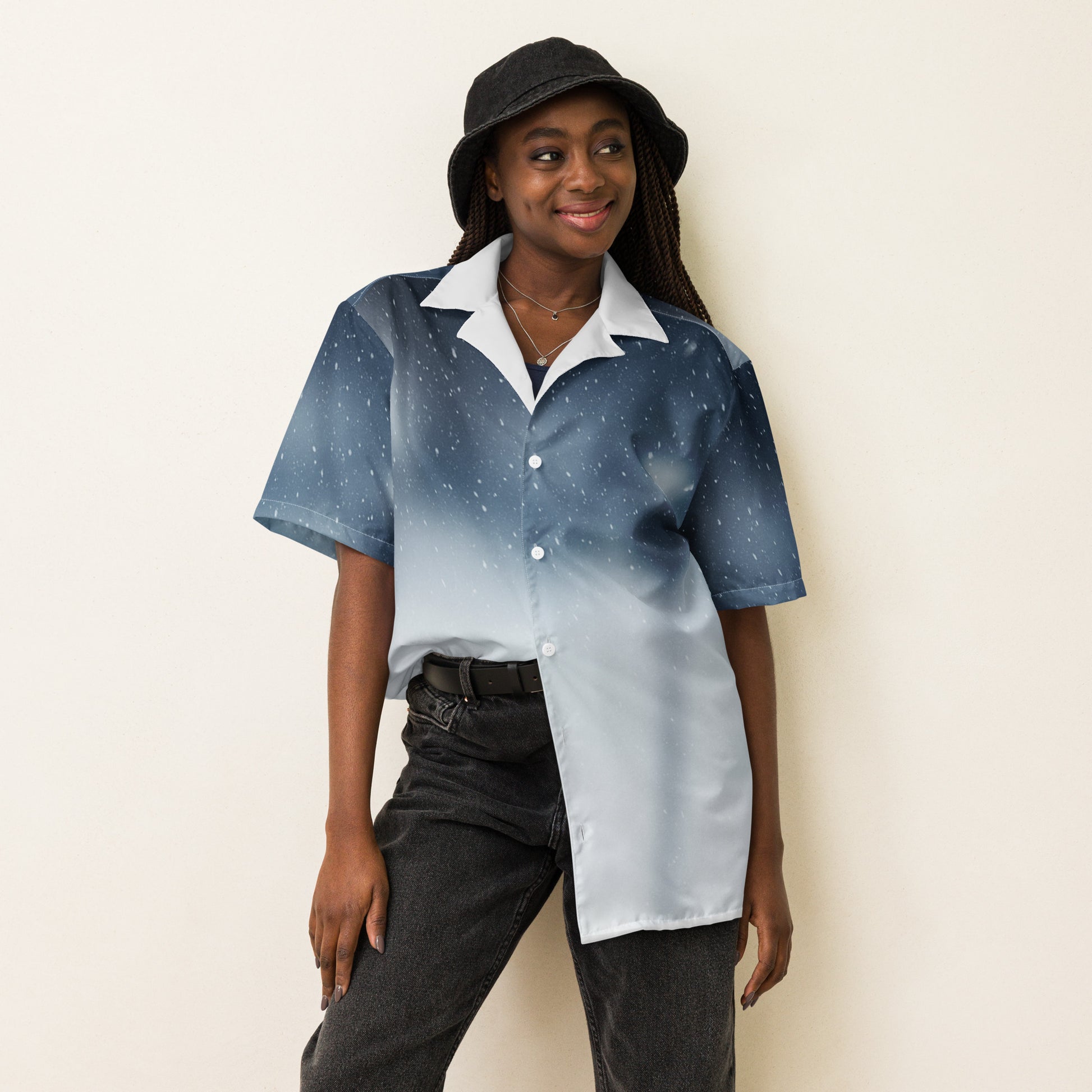 PJ Designs unisex casual button shirt with blue and white gradient star pattern worn with black pants and bucket hat