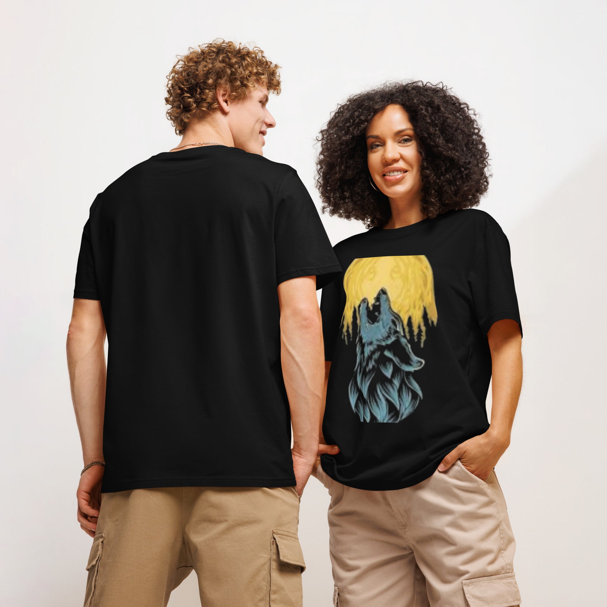 Couple wearing black unisex organic ribbed neck t-shirt featuring an artistic design