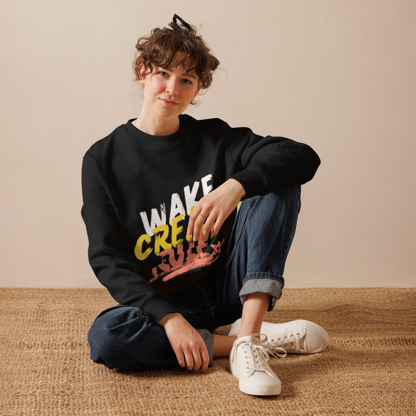 PJ Designs black unisex crewneck sweatshirt for men and women with colorful wake creek print