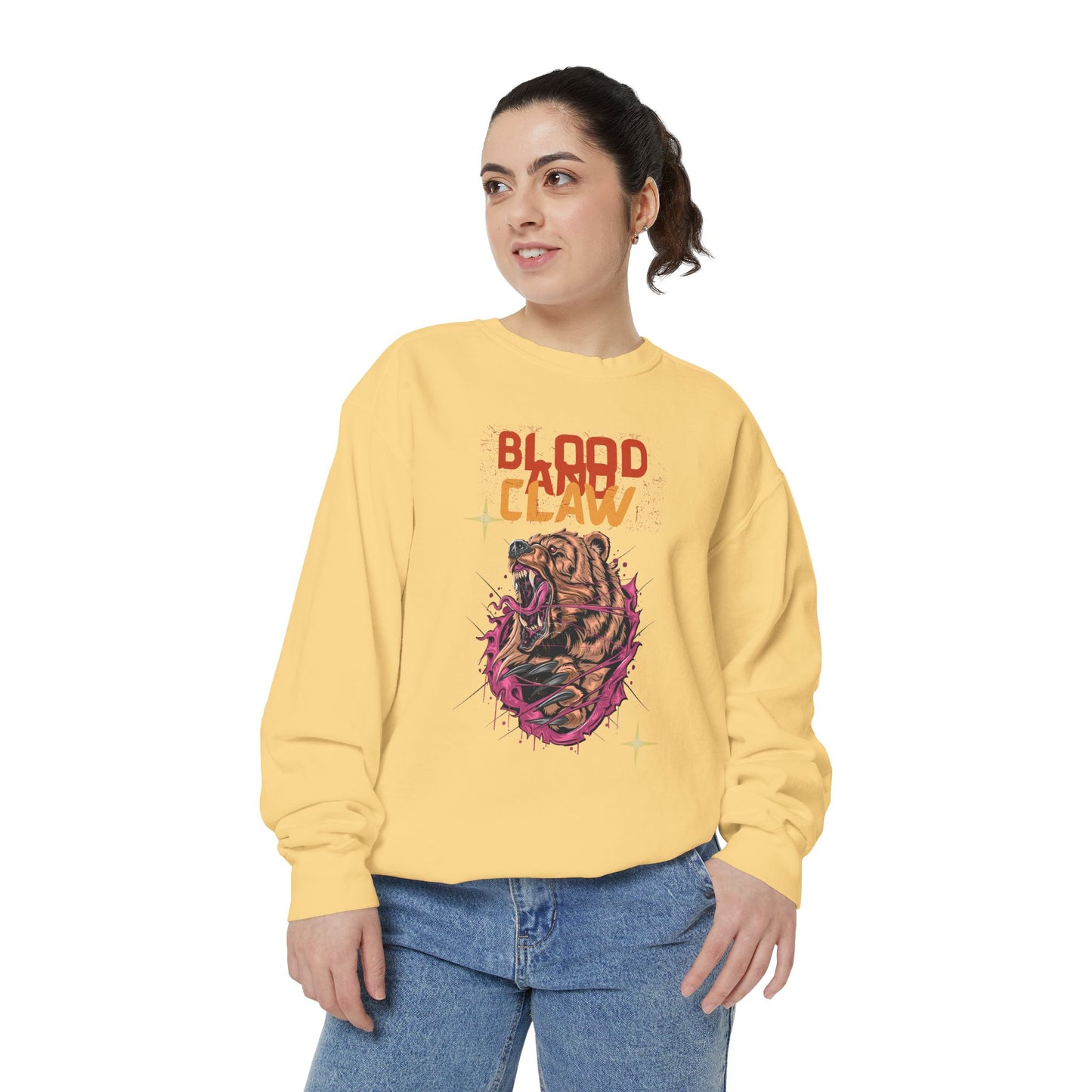 Printify yellow sweatshirt with Blood Claw heart and claw graphic worn by model unisex animal lover sweatshirt